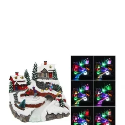 Village De Noël Lumineux Avec Patineur Animé